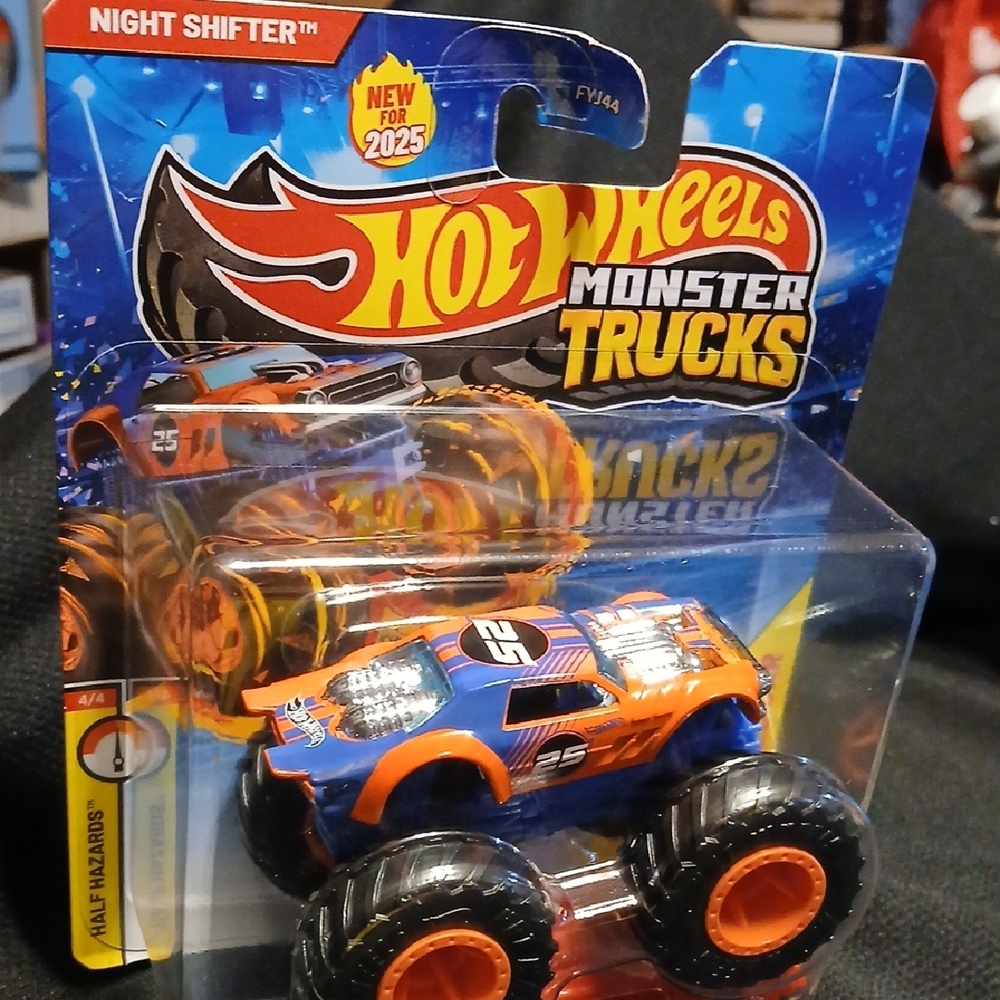 Night Shifter Hot Wheels Monster Trucks Blue and Orange With Crushed Car